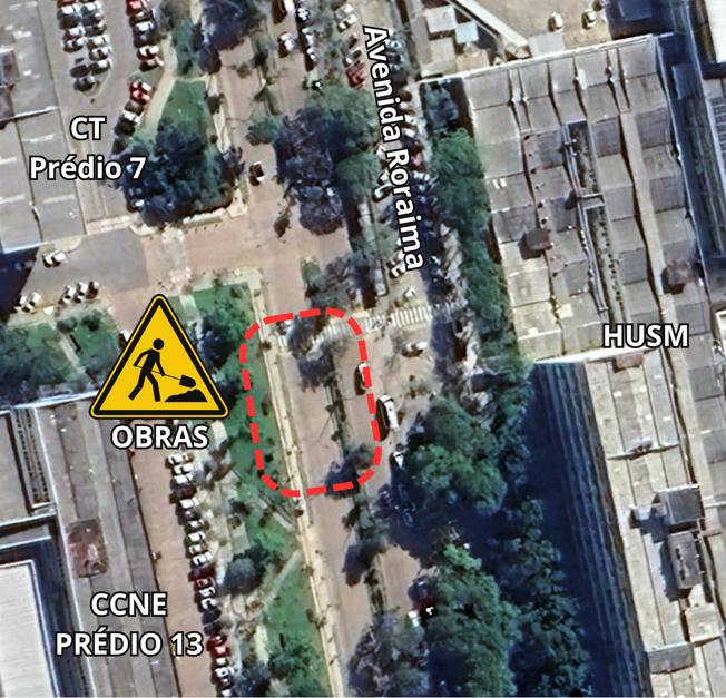 Imagem colorida aérea de trecho a ser concertado. Mostra o prédio 13, do CCNE e o prédio do HUSM. Circulado em pontilhado vermelho, a região da avenida onde será feita a obra.